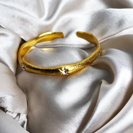 Satin Gold Swirly Bracelet wirh Stone