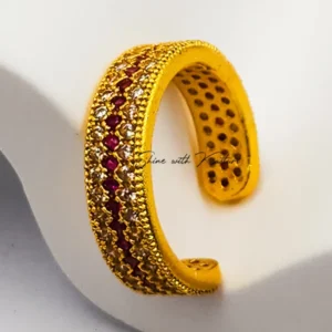 Ring embellished with ruby zircons