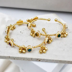 Multi‑Stone Pearl‑Bordered Gold Bangles