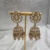 Pink Kundan Jhumka Earrings with Floral Stud