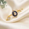 Ruby Blue Polki & Pearl Adjustable Ring